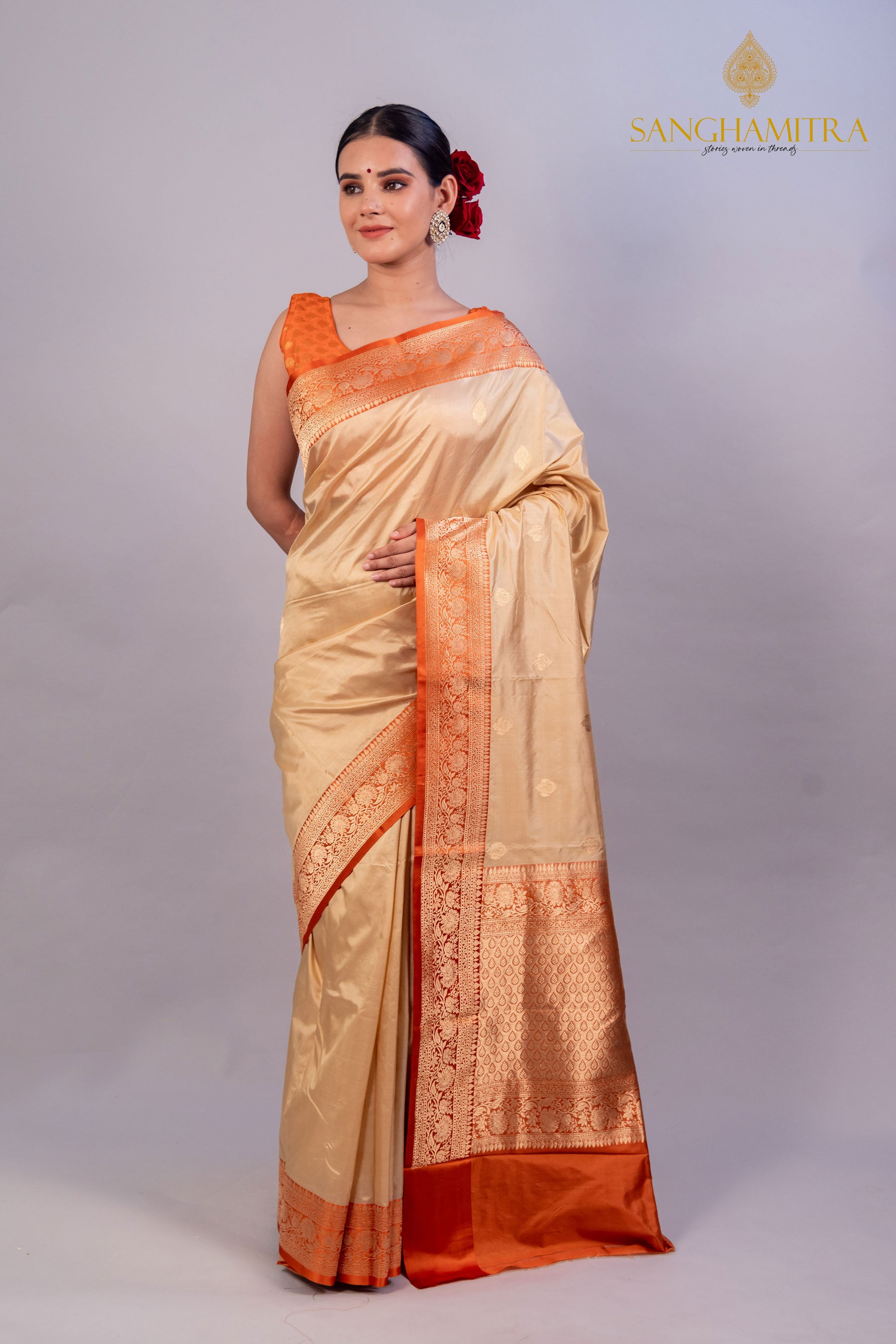 Graceful Beige Pure Katan Silk Handloom Saree with Orange Border