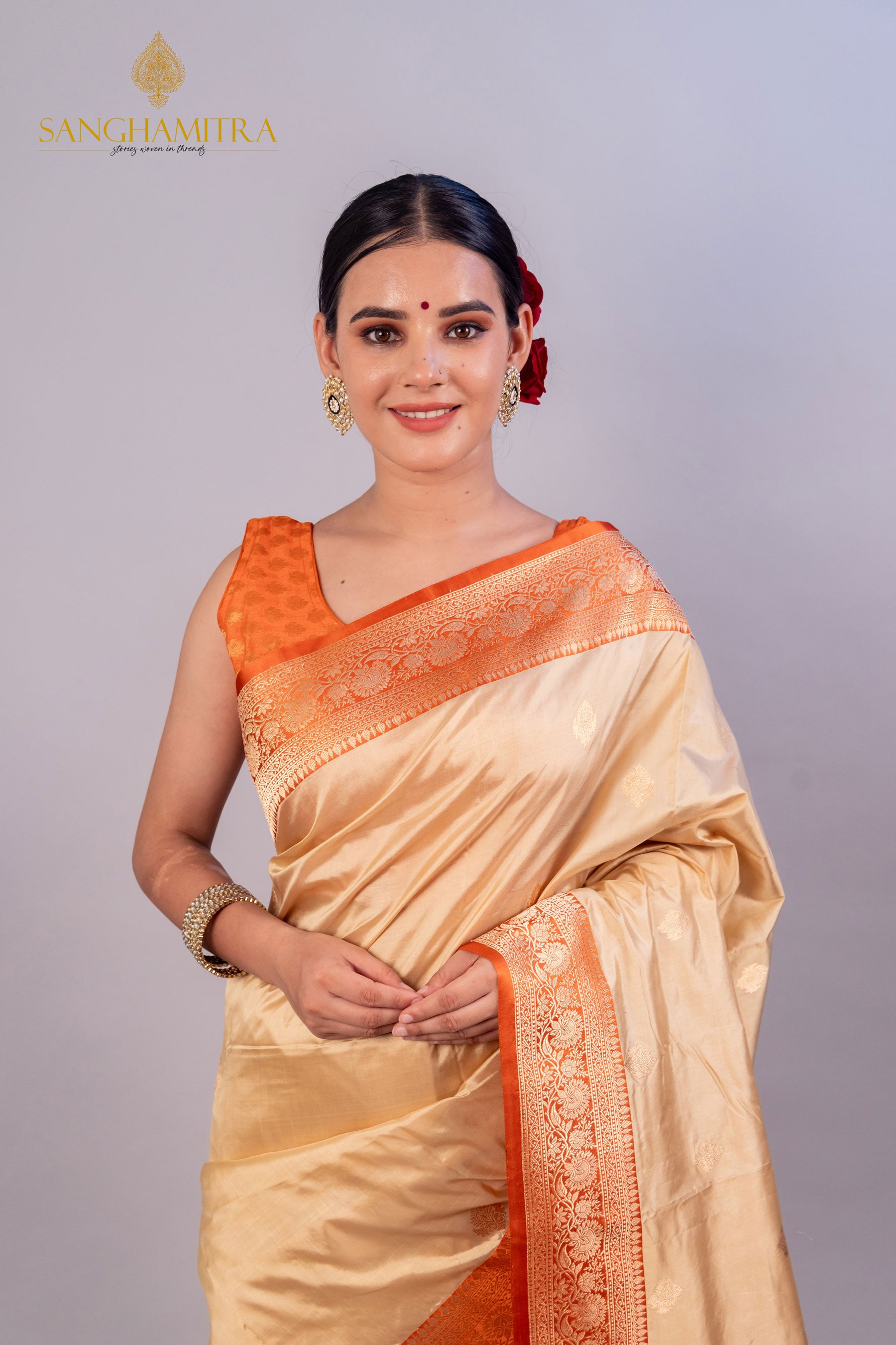 Graceful Beige Pure Katan Silk Handloom Saree with Orange Border