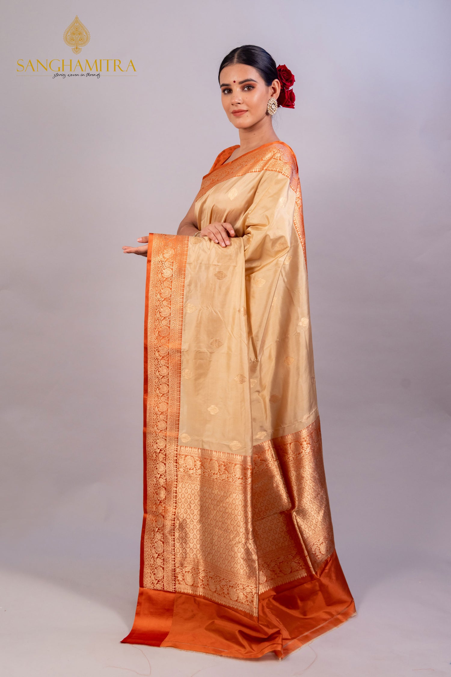 Graceful Beige Pure Katan Silk Handloom Saree with Orange Border