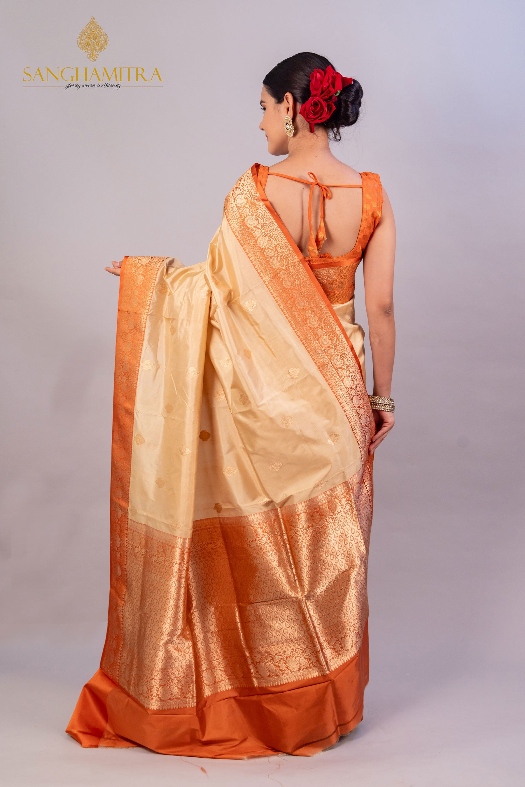 Graceful Beige Pure Katan Silk Handloom Saree with Orange Border