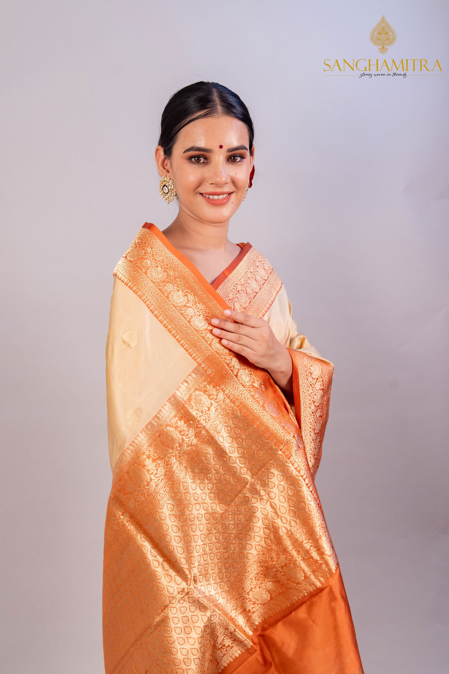 Graceful Beige Pure Katan Silk Handloom Saree with Orange Border