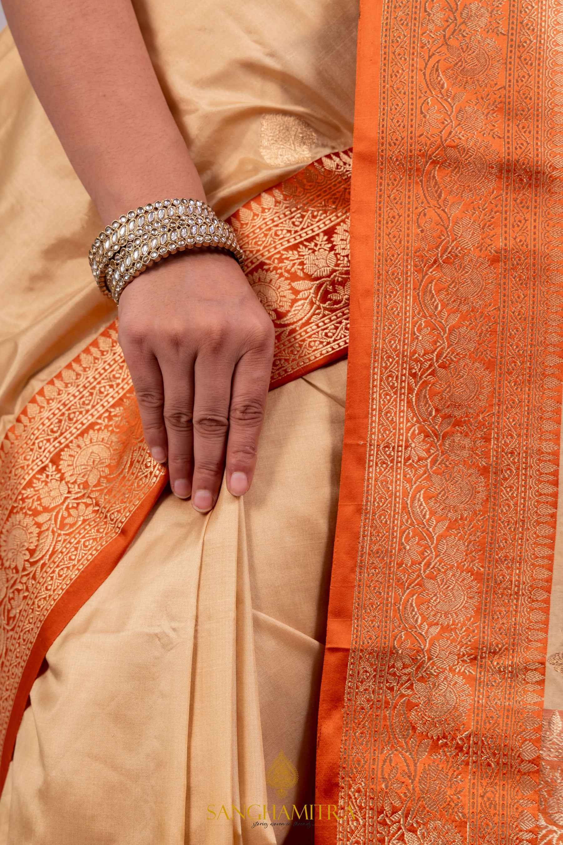 Graceful Beige Pure Katan Silk Handloom Saree with Orange Border